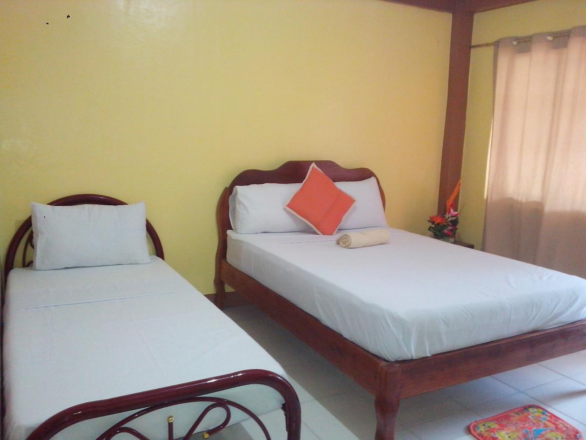 Centillo Travellers Inn Катиклан Экстерьер фото