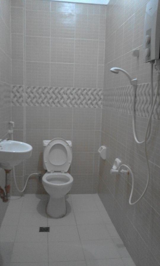 Centillo Travellers Inn Катиклан Номер фото